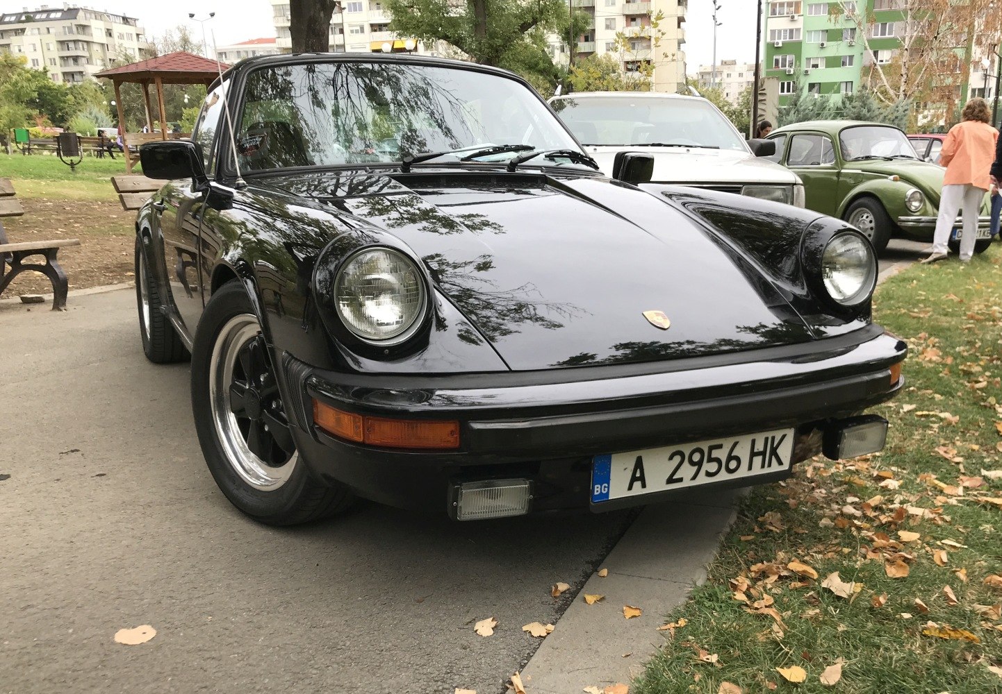 Close-up front view with round headlights and sleek aerodynamic hood