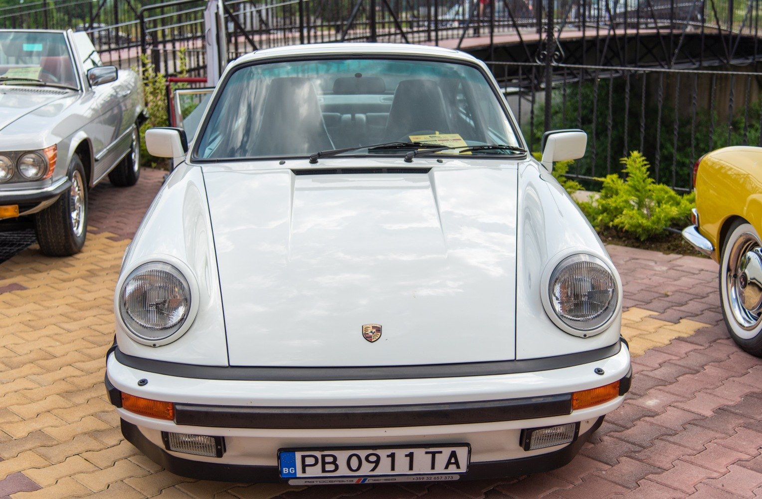 Front view of classic Porsche 911 with round headlights and distinct hood