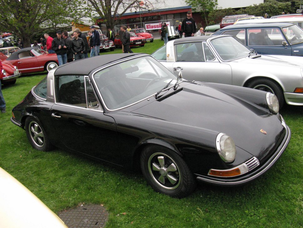 Classic sports car with distinctive Targa roof and vintage design.