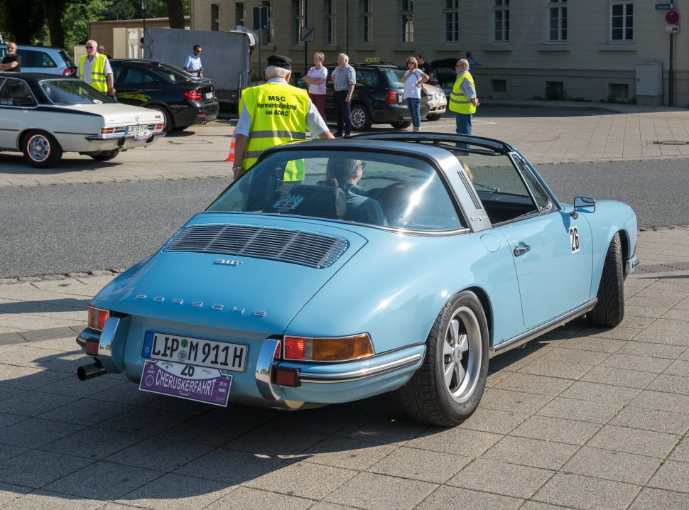 Light blue convertible with targa roof and classic rear design