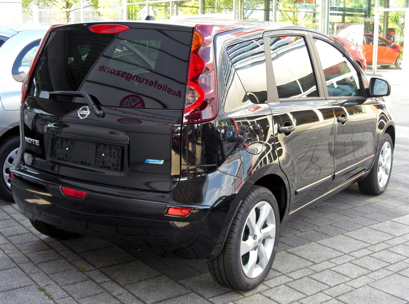 Rear view of compact hatchback with vertical tail lights
