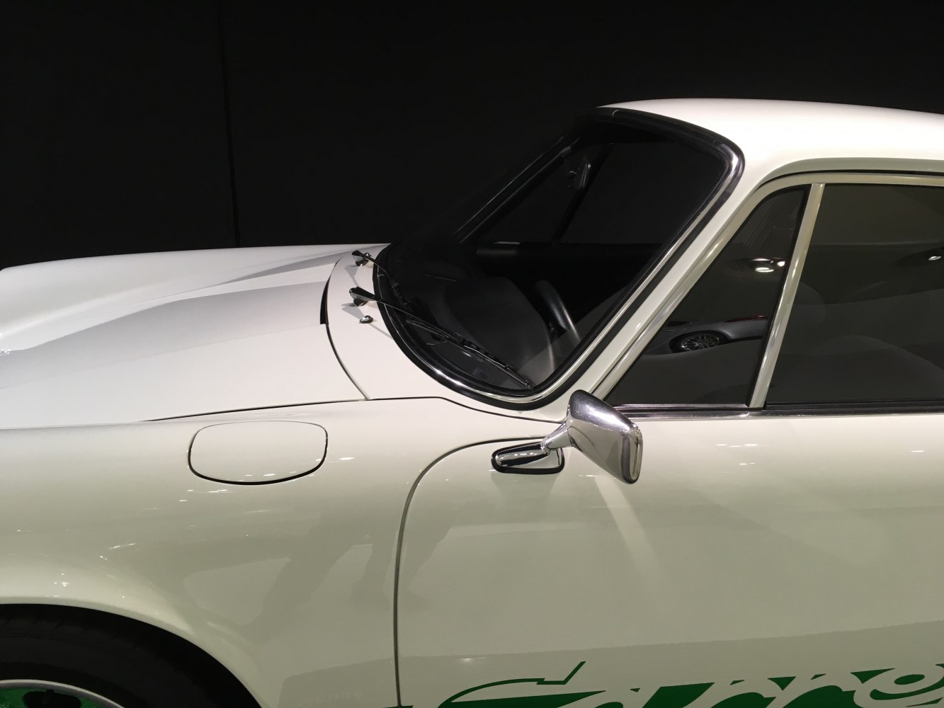 Side profile with door, mirror, and window