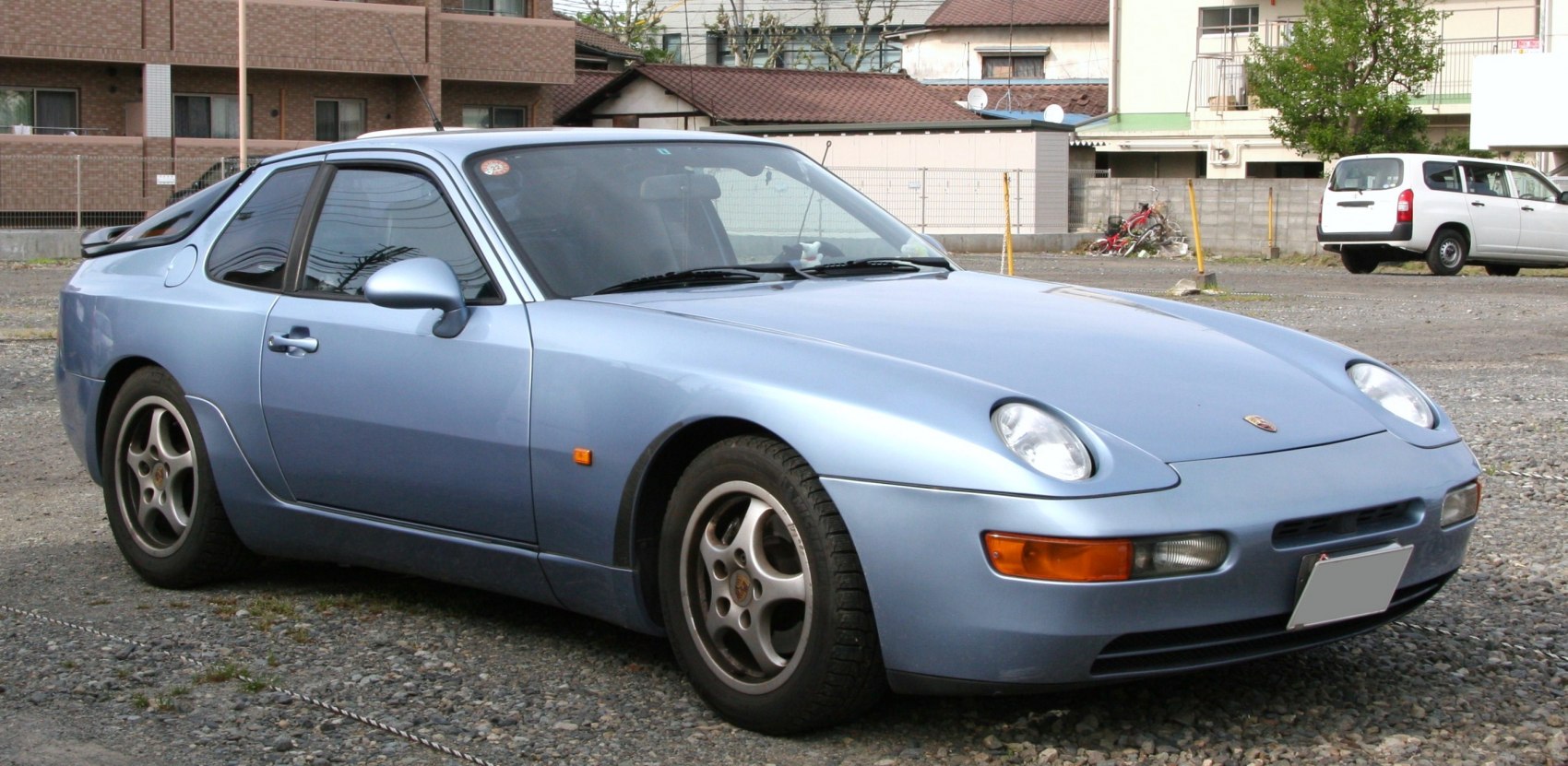 Pop-up headlights and aerodynamic coupe design