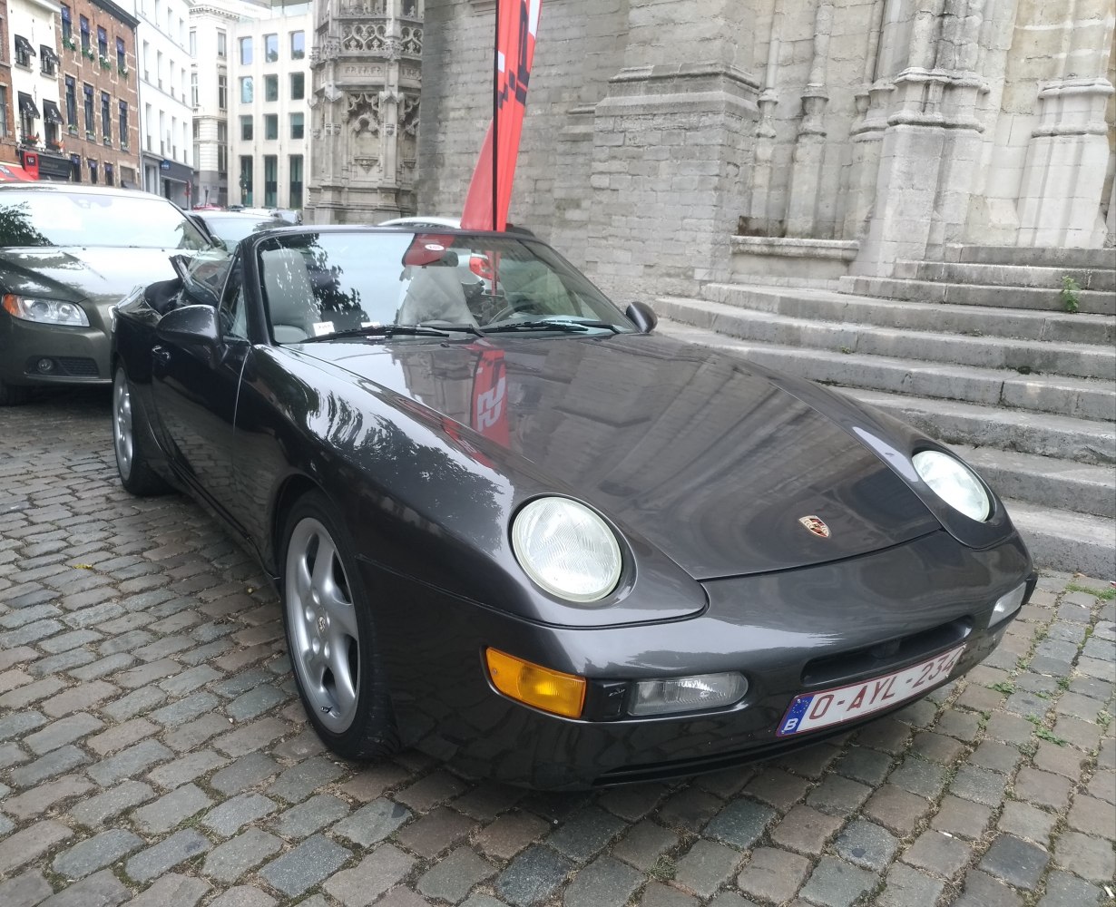 Convertible sports car with pop-up headlights and smooth aerodynamic body