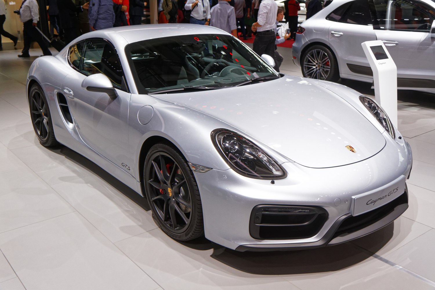 Silver sports coupe with aerodynamic design and black alloy wheels