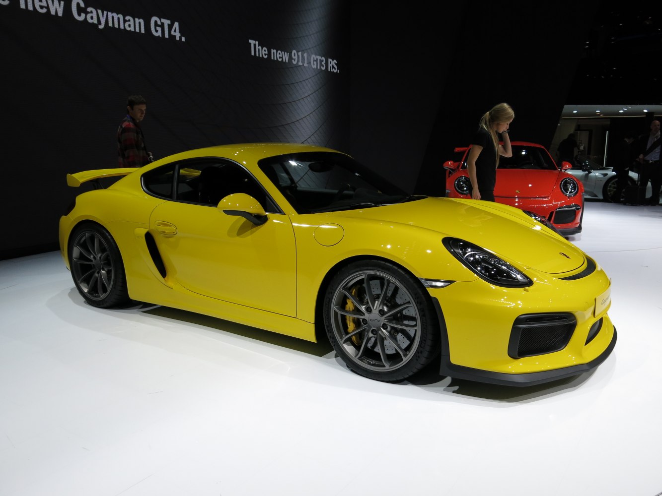 Yellow 2013 sports coupe with aerodynamic features and racing wheels