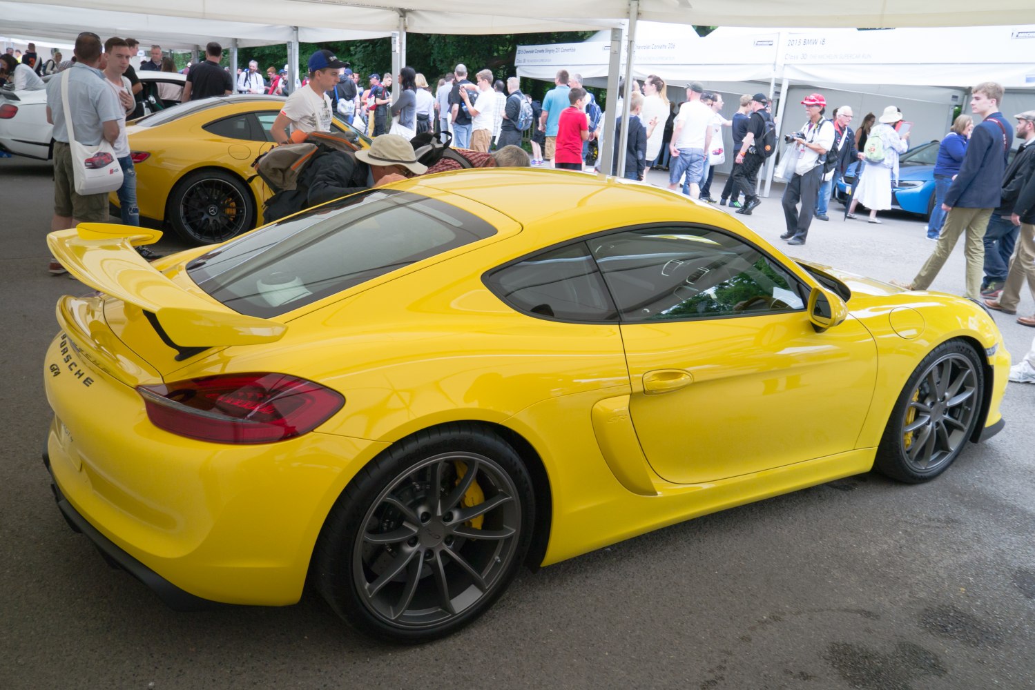 Yellow sports coupe with rear spoiler and side air vents
