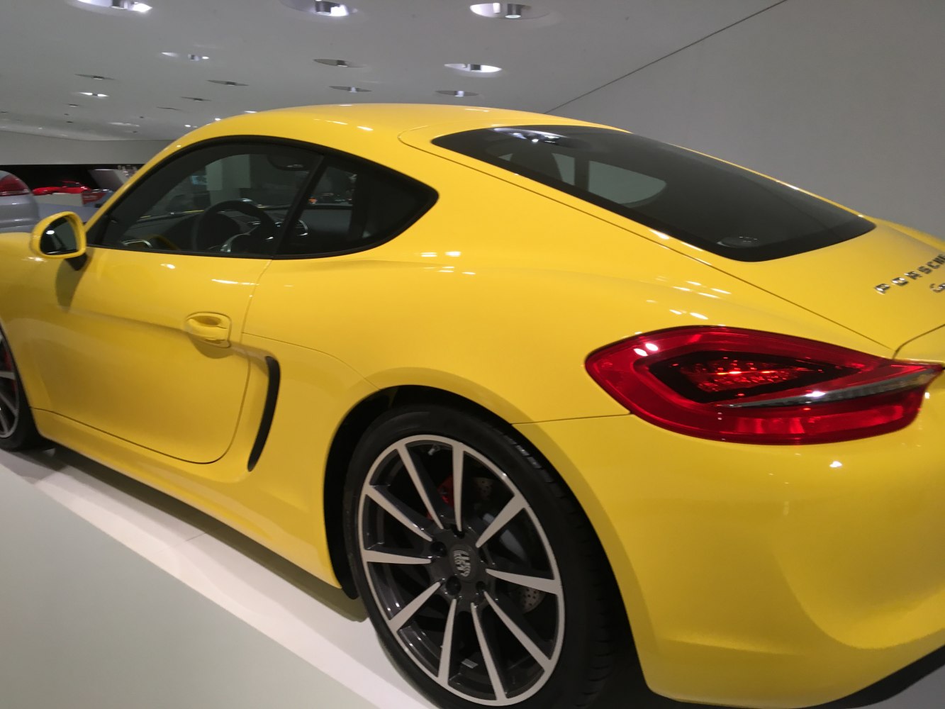 Rear side view with alloy wheels and side air intake