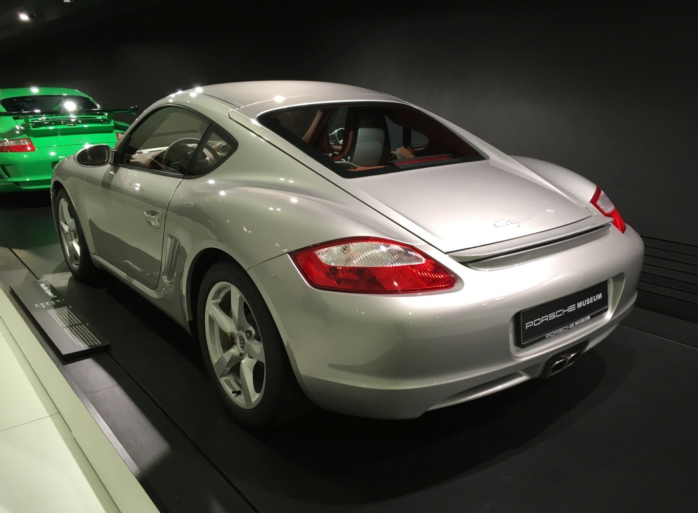 Rear three-quarter view with distinctive taillights and side vents