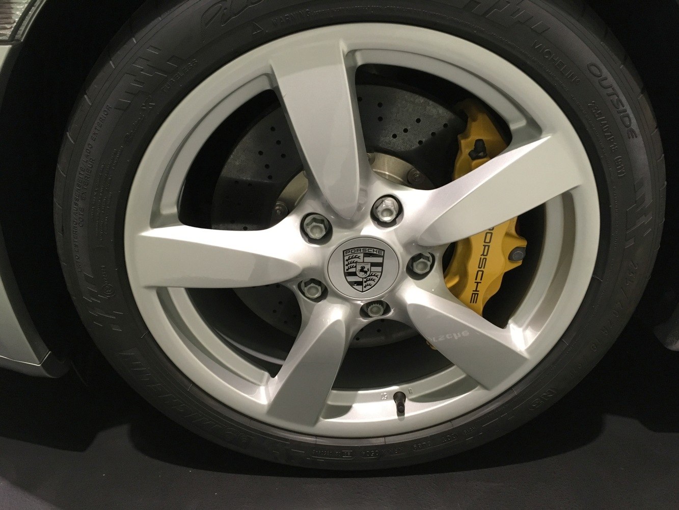 Alloy wheel with yellow brake caliper