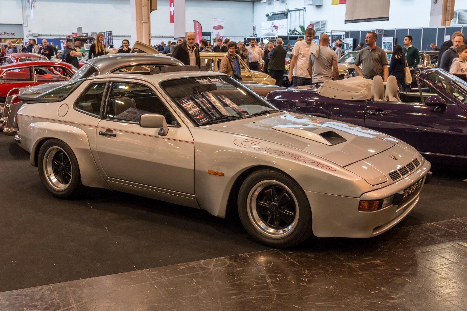 Sporty coupe with wide fender flares and a hood scoop