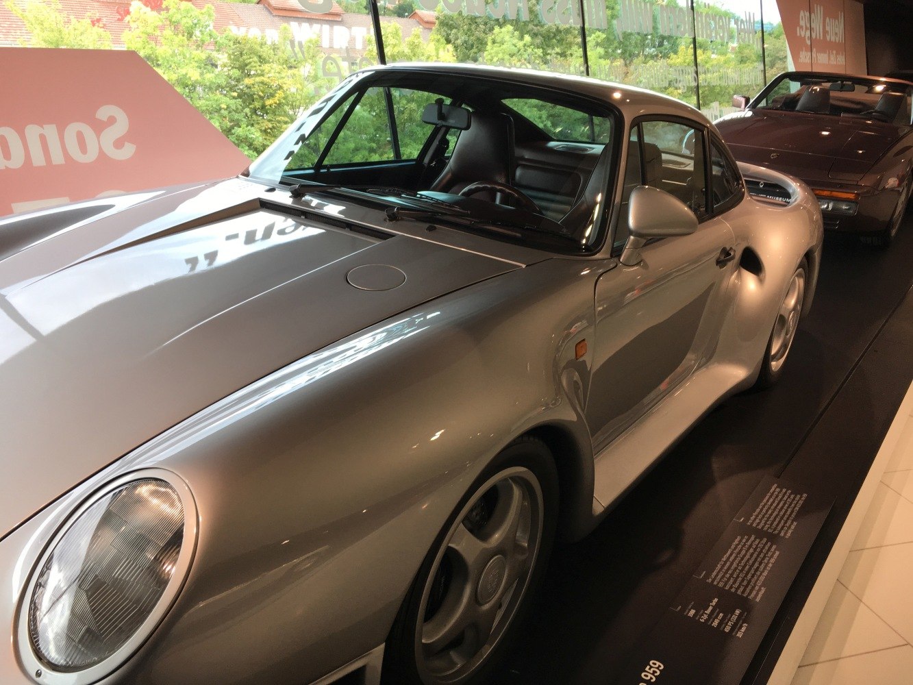 Aerodynamic body and sleek front with iconic round headlight and air intake vent.