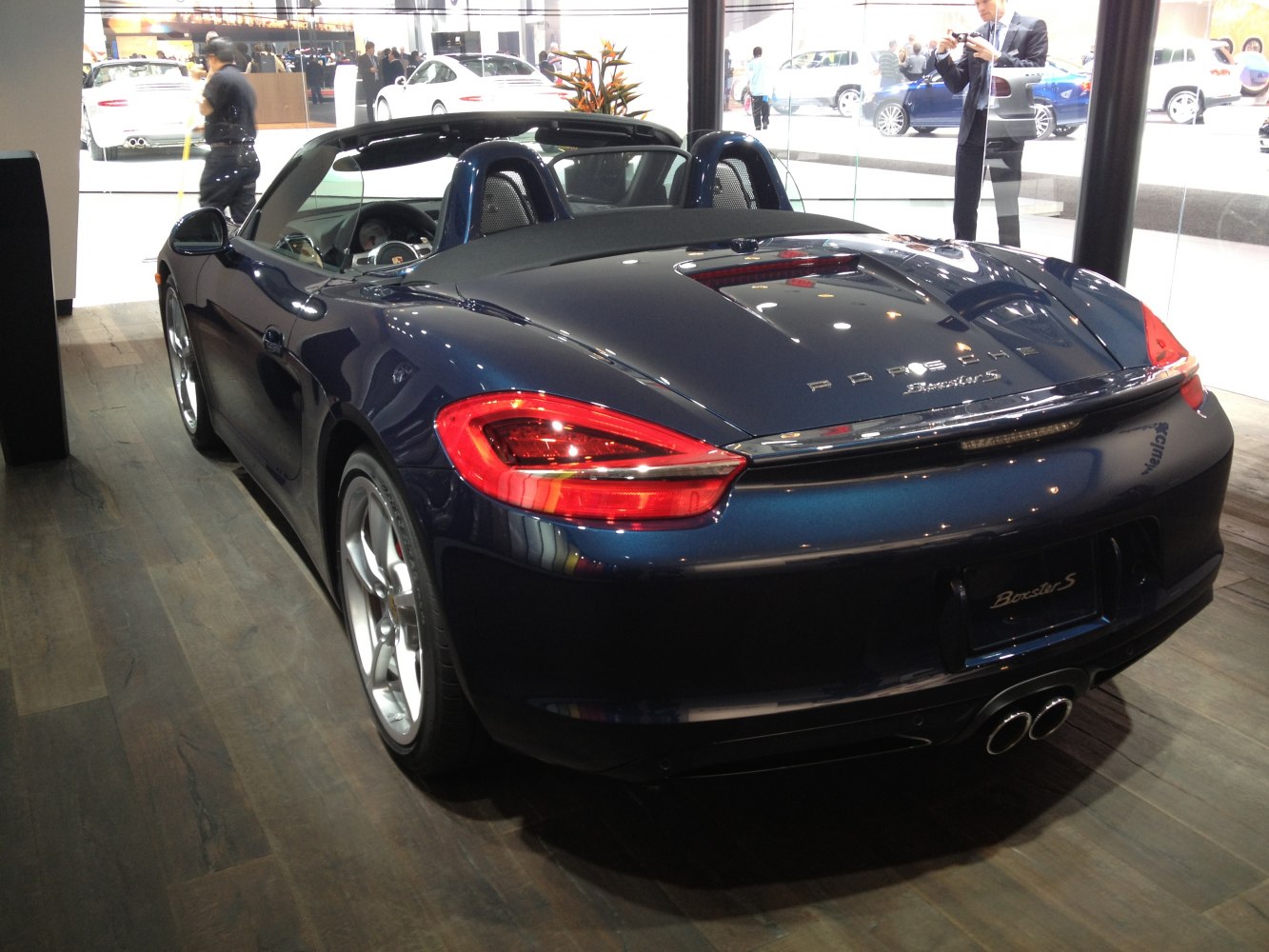 Rear view of a convertible showing taillights and dual exhaust