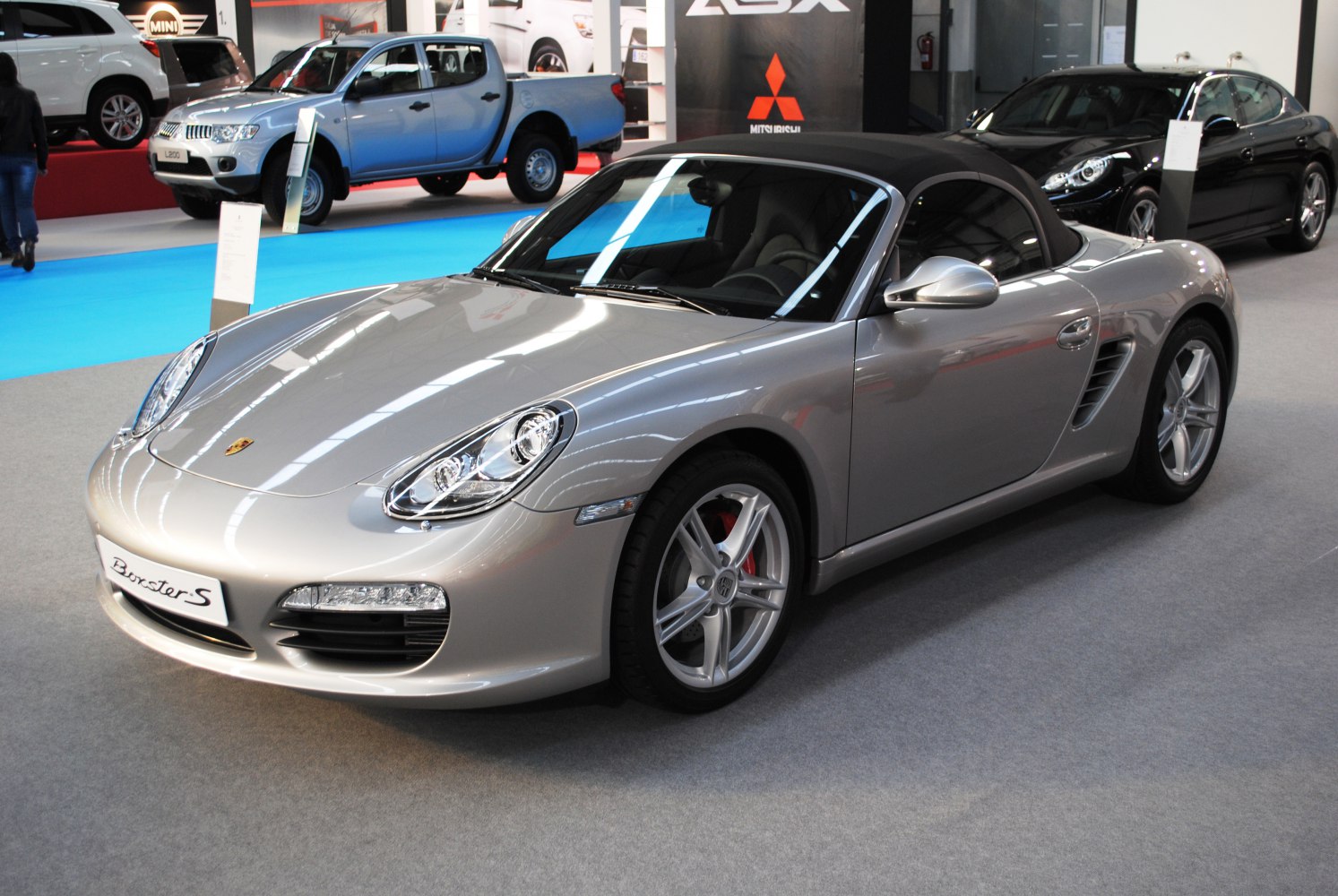Silver convertible with sporty front and alloy wheels