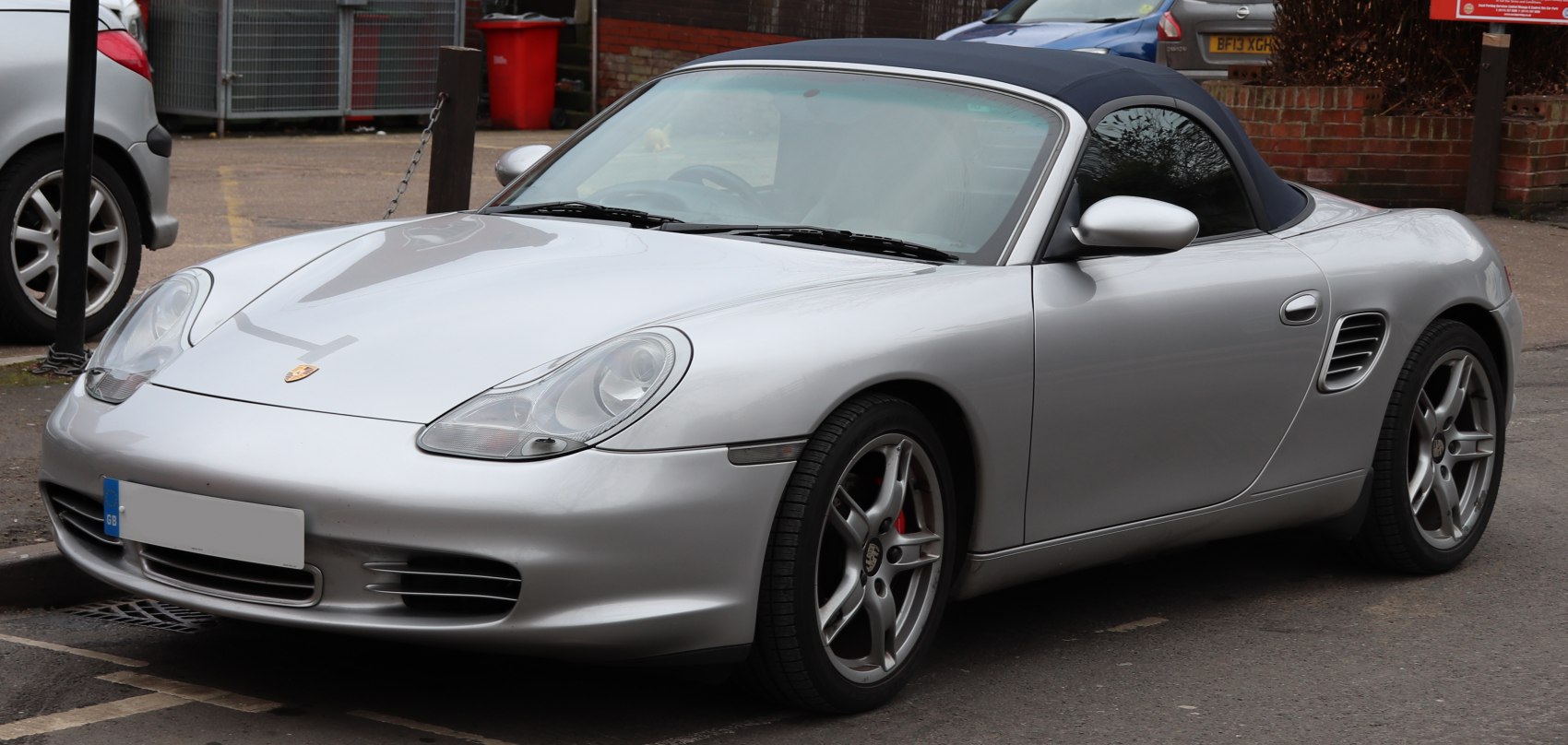 Sporty convertible with oval headlights and multi-spoke alloy wheels