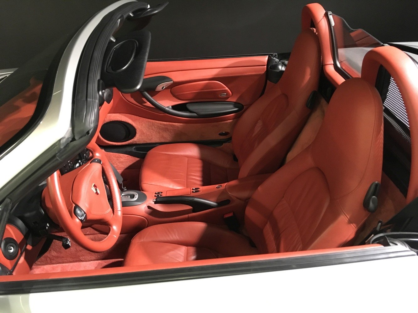 Detailed red leather interior of a sporty convertible car