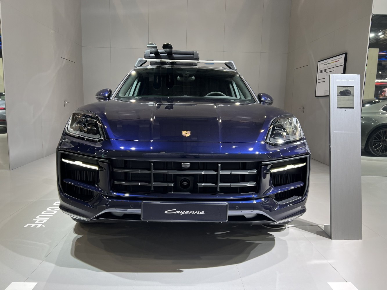 Front view with grille and LED headlights