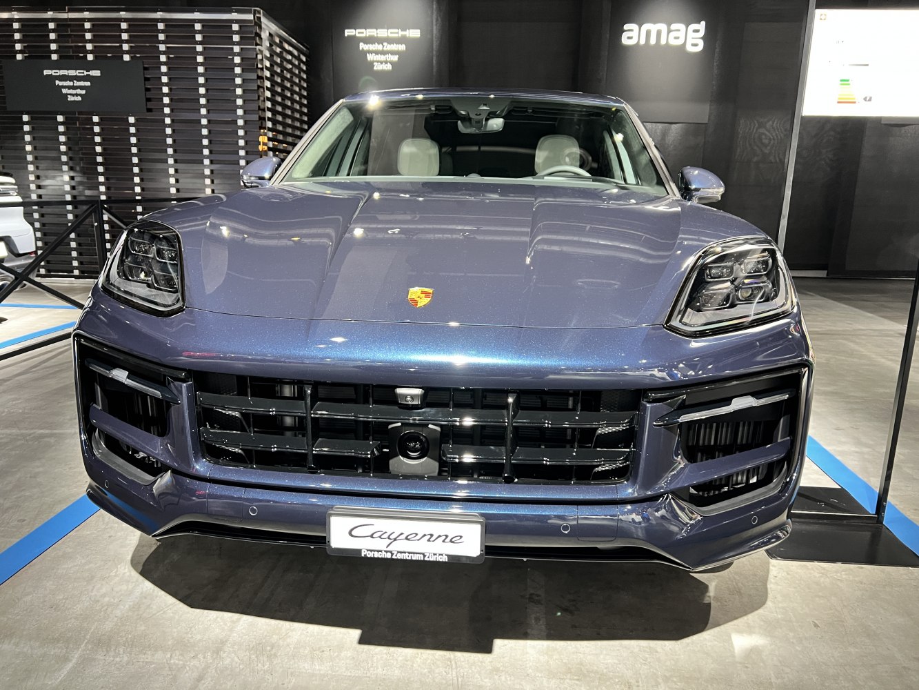 Front view with LED headlights and aggressive grille design