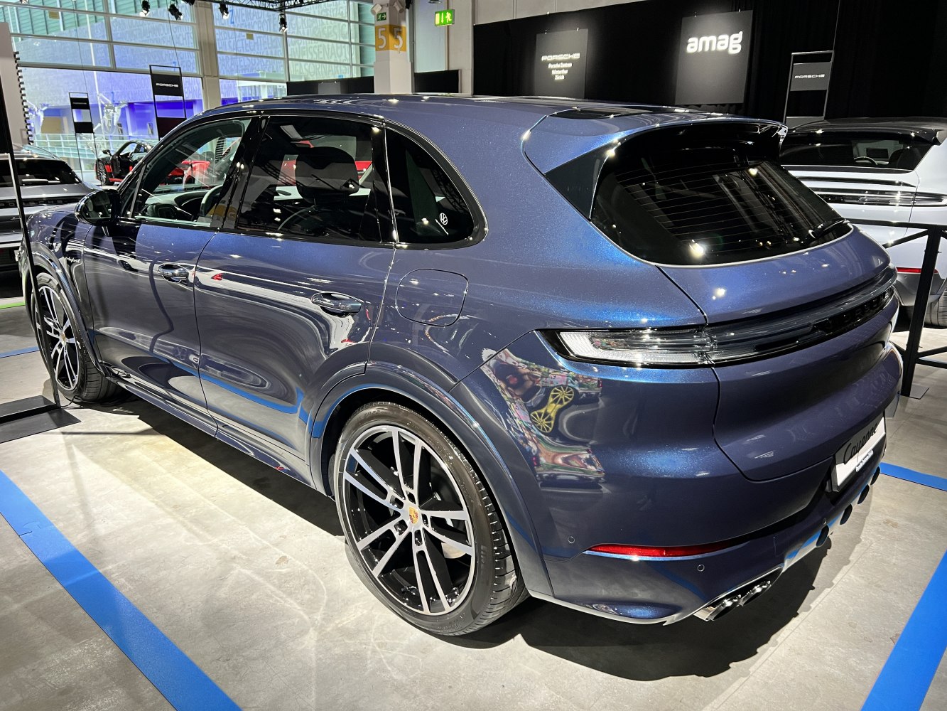 Rear and side view of a modern SUV with sleek taillights and distinctive alloy wheels