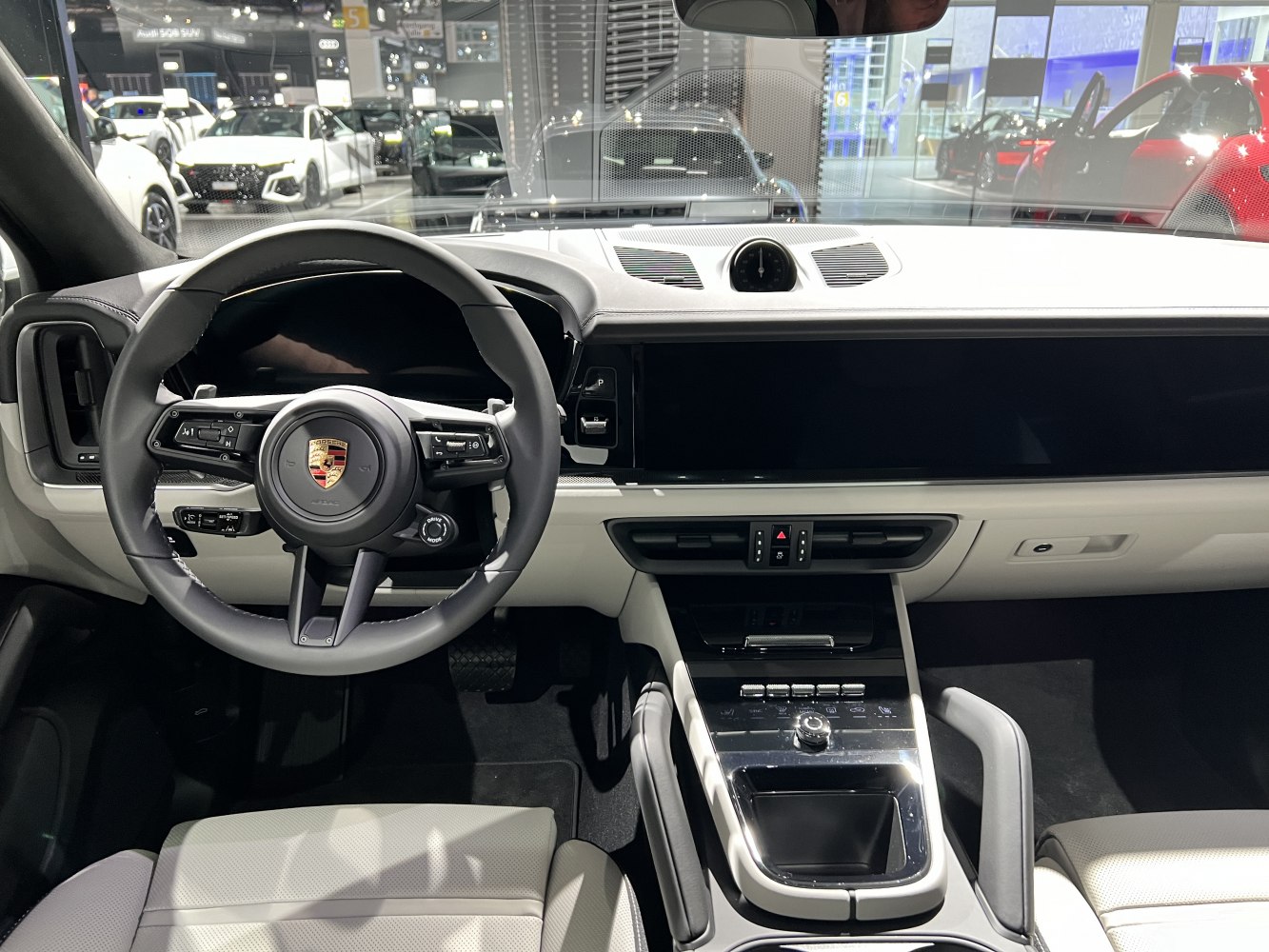 Modern luxury dashboard and steering wheel with digital display and central console