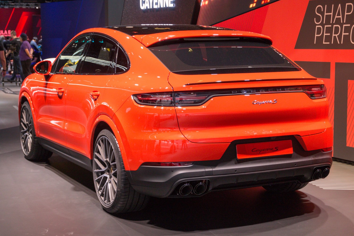 Orange SUV coupe rear with LED taillights and quad exhaust tips