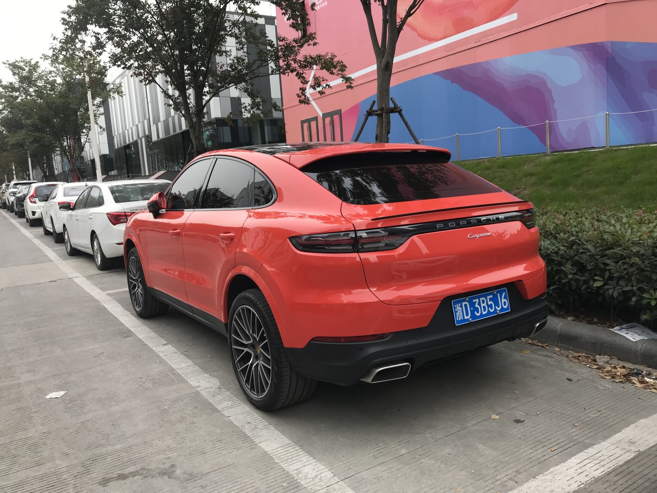 Rear view and taillights of a sporty SUV with coupe styling.