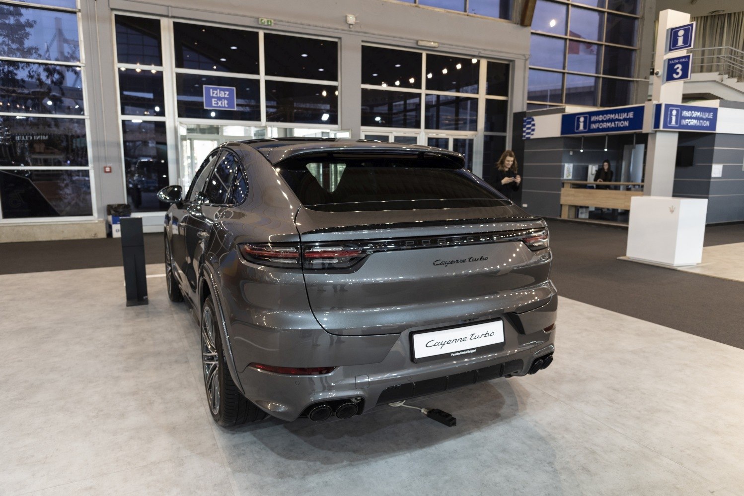 Rear view of SUV with sleek tail lights and quad exhaust pipes