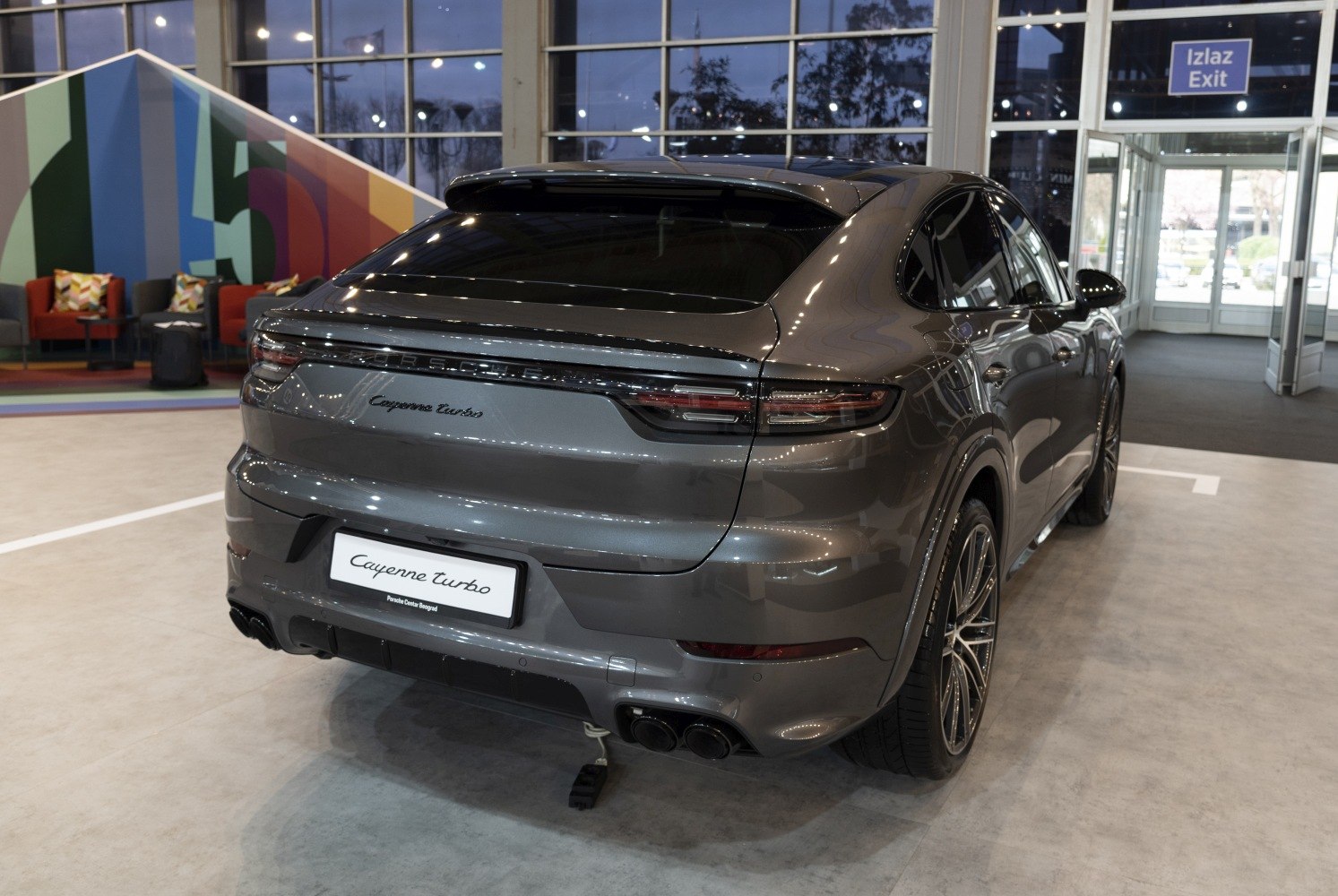 Rear design with quad exhausts and spoiler of a modern sporty SUV