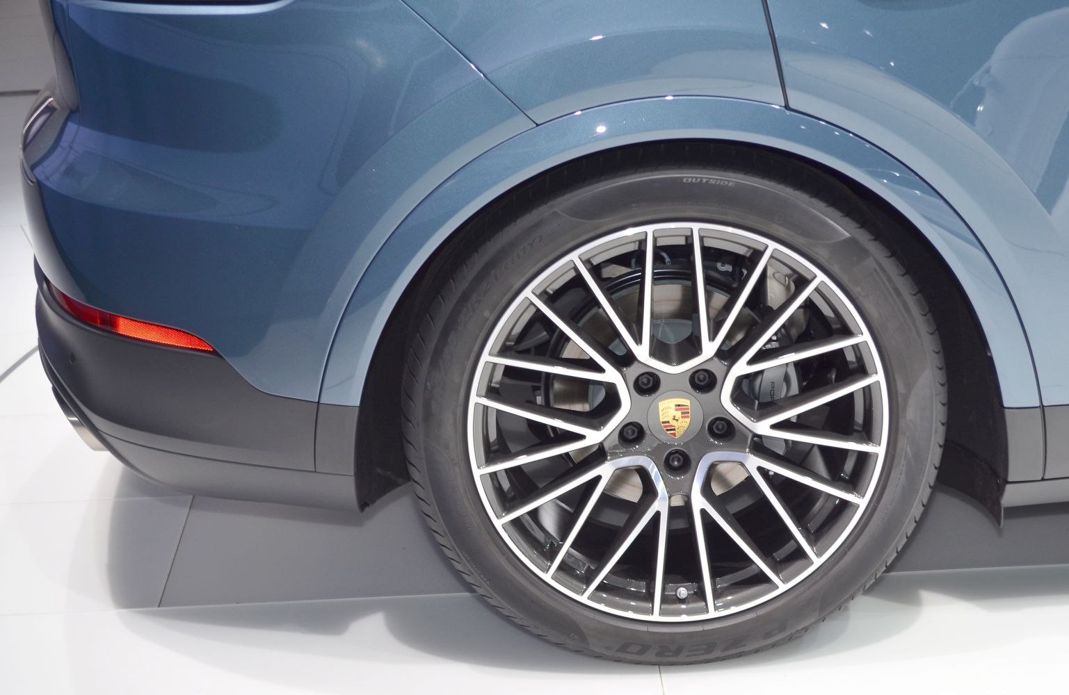 Close-up of alloy wheel and rear fender with stylish multi-spoke rim