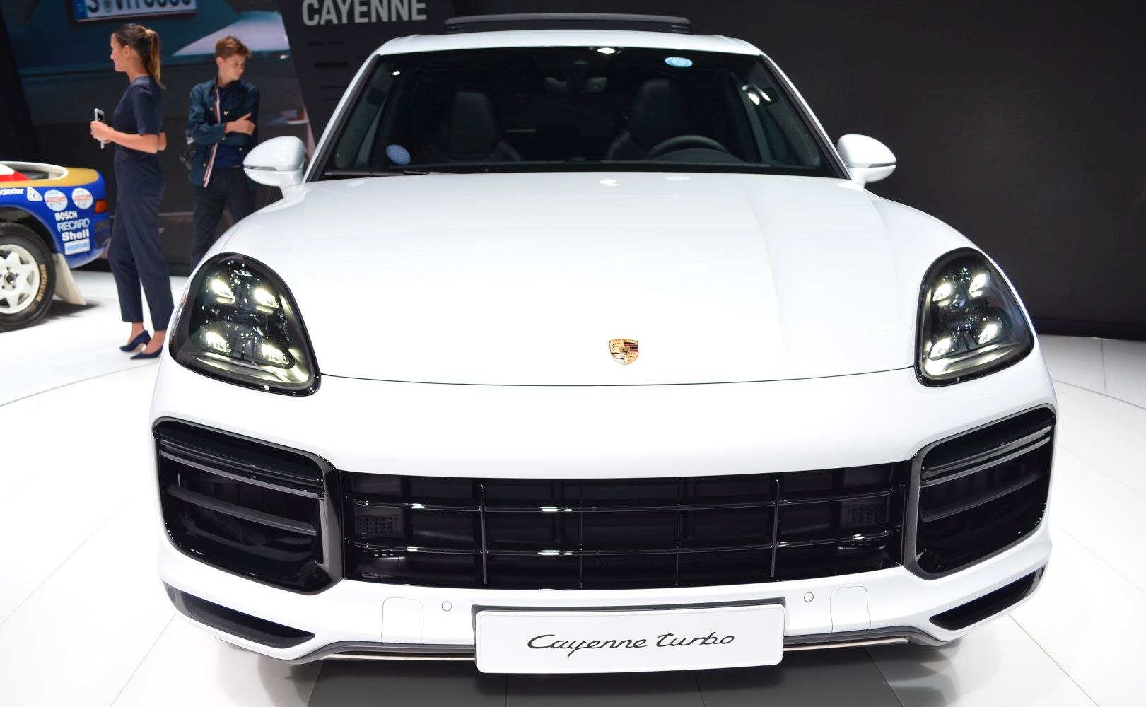 Front view with LED headlights and large black grille