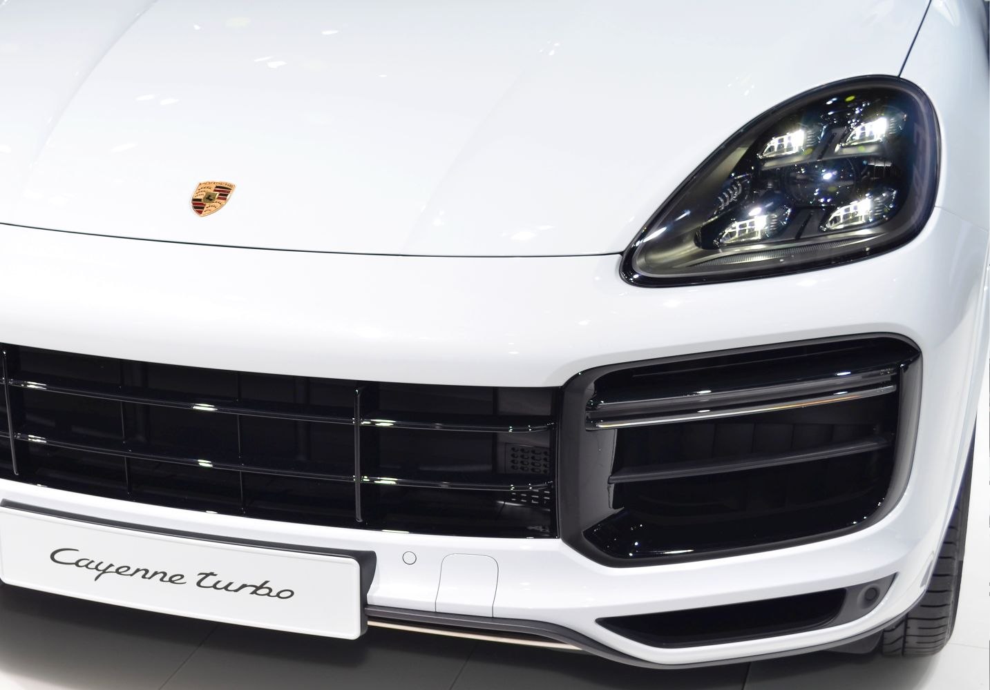 Close-up of front grille and LED headlights