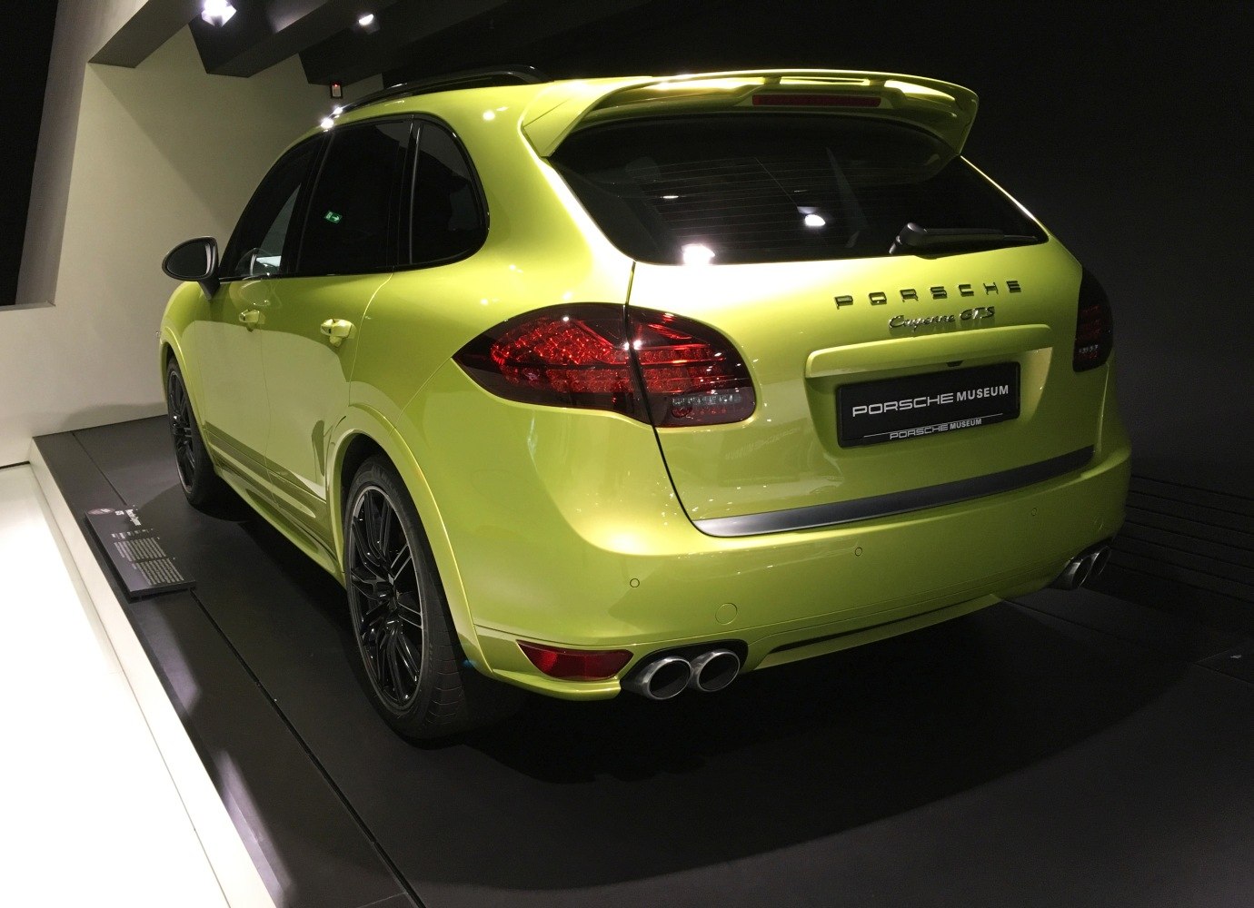 Sporty rear with dual exhausts and sleek taillights