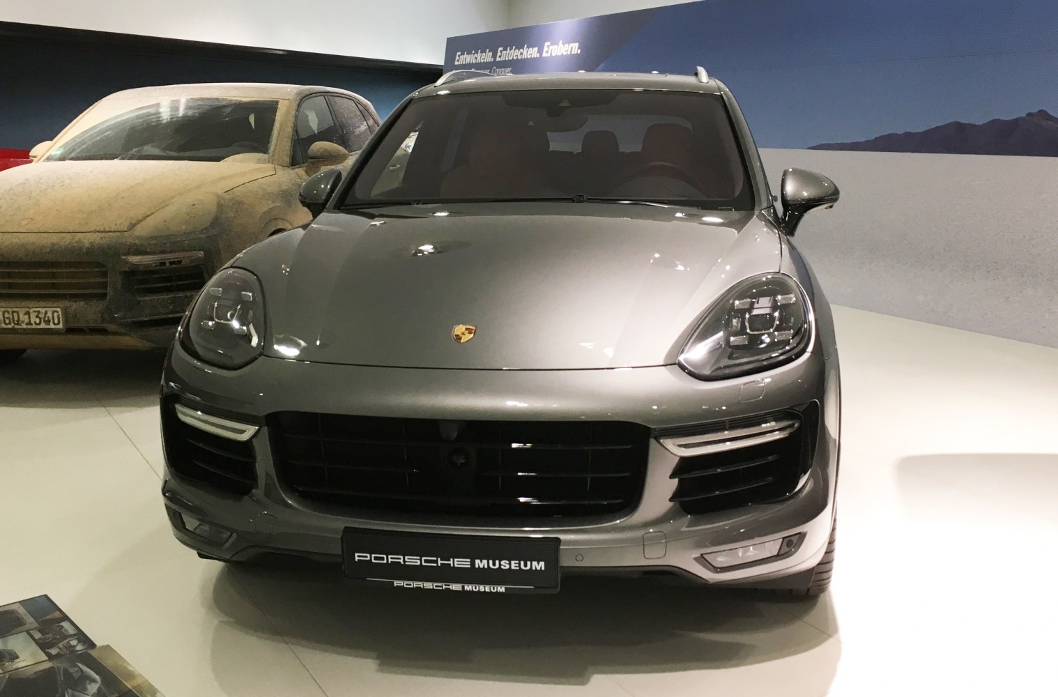 Front view of SUV with distinctive headlights and bold grille