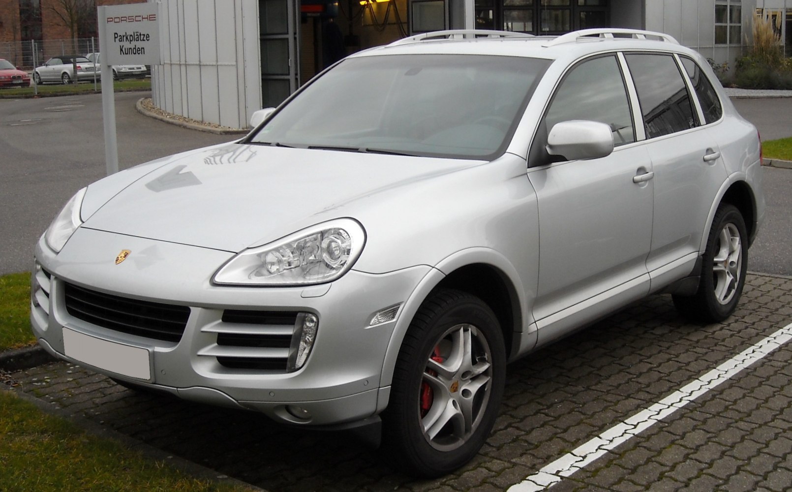 Silver SUV with distinctive front grille and side profile