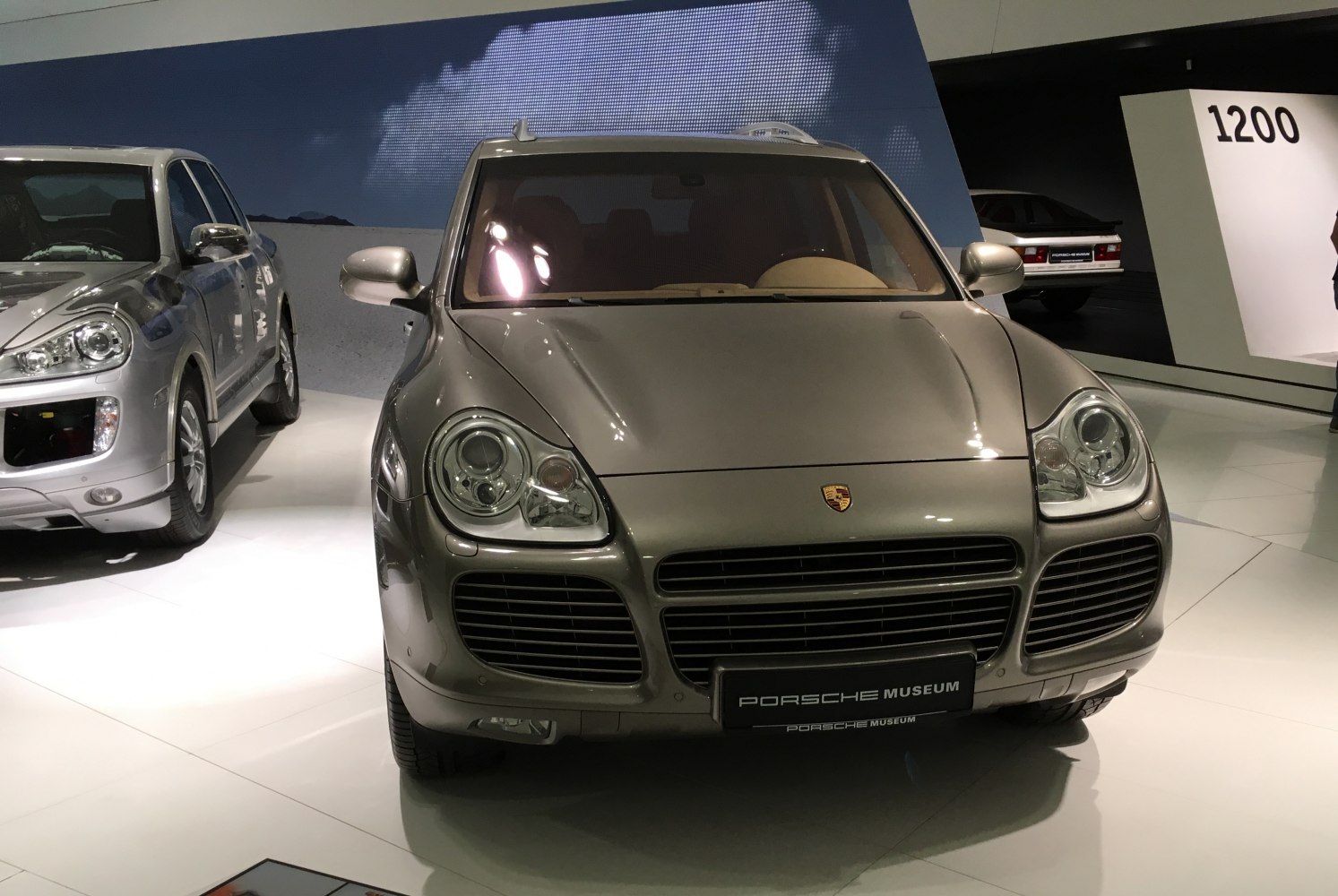 Front view of SUV with distinctive headlights and wide grille