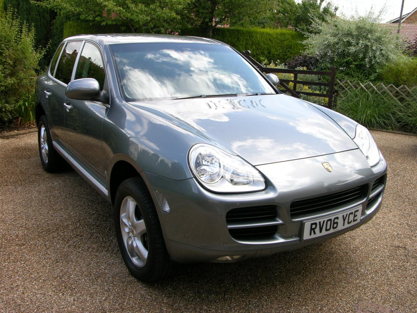 Front view of SUV with rounded headlights and compact grille