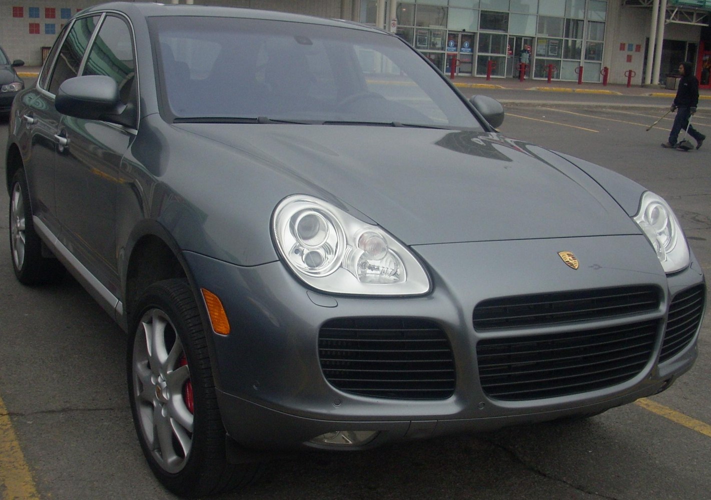Close-up of SUV front with headlights and grille