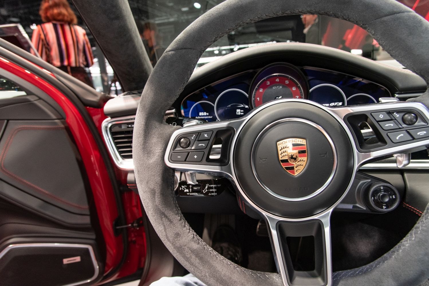 Steering wheel, instrument cluster, control buttons close-up