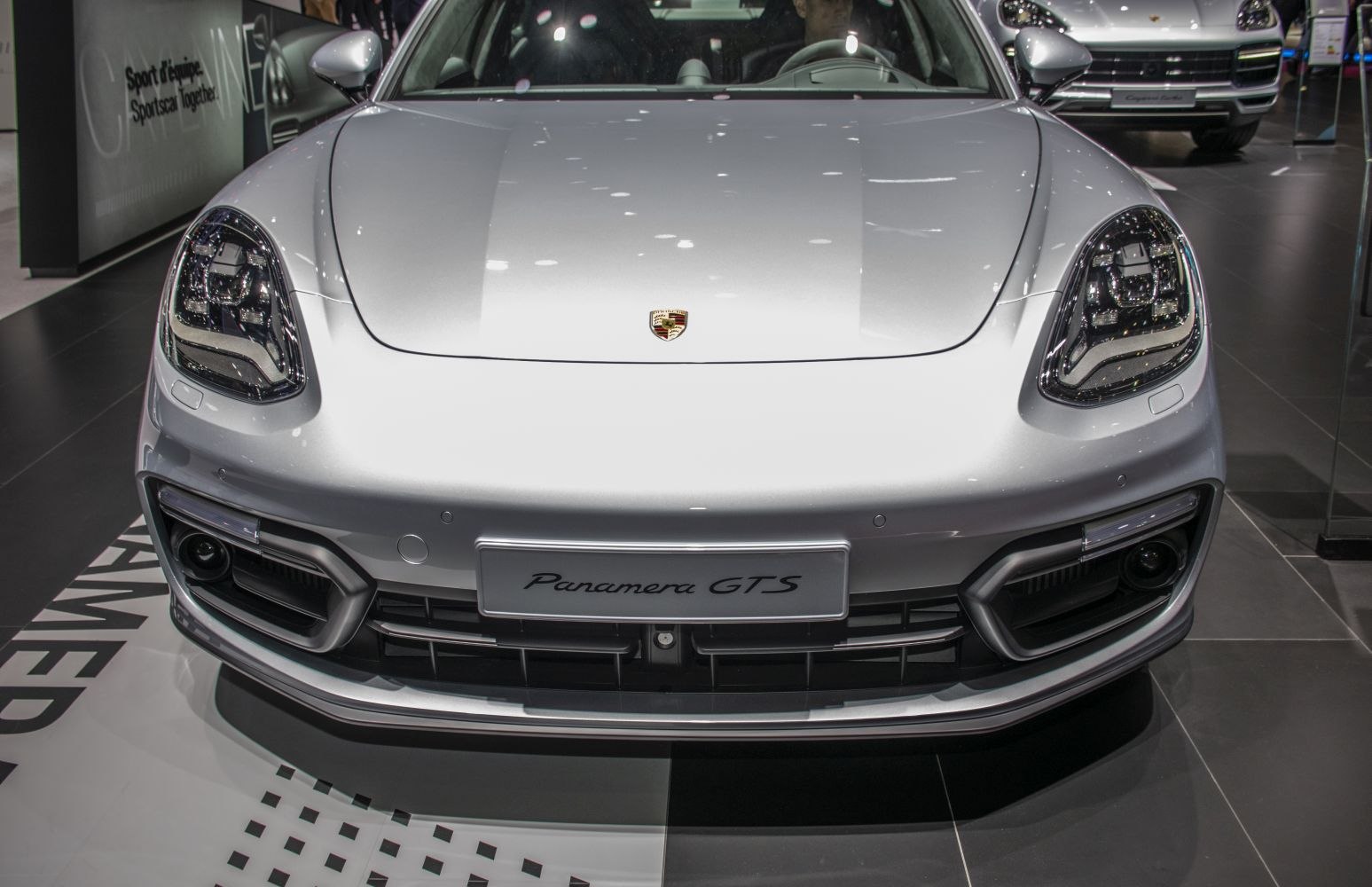 Close-up of LED headlights and sporty front grille design