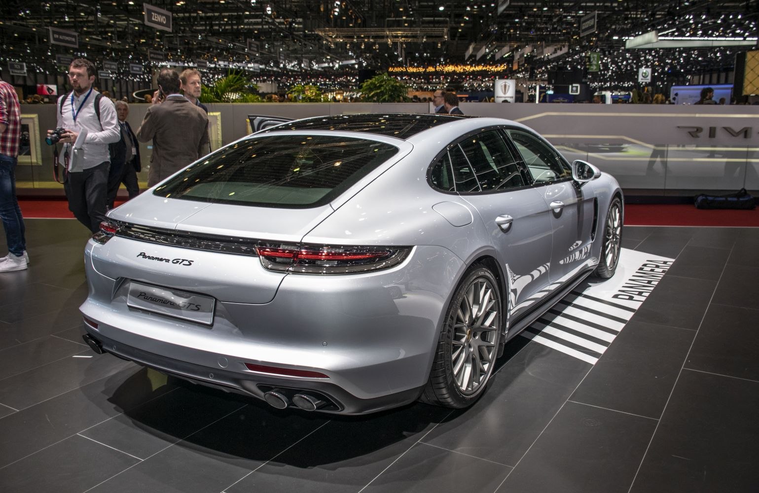Rear and side view with quad exhaust and sleek taillights