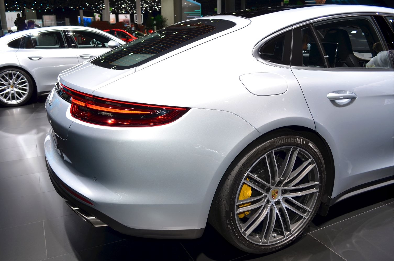 Sleek rear taillights and alloy wheels with yellow brake calipers