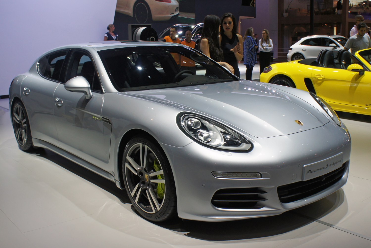 Silver luxury sedan with LED headlights and alloy wheels