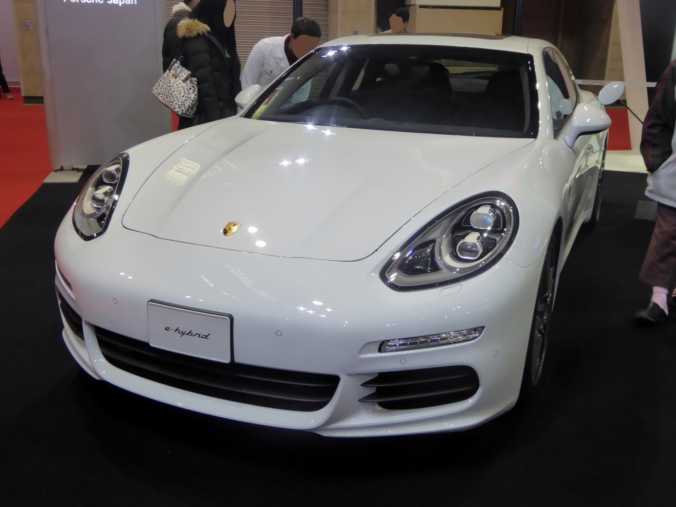 Front view with sleek headlights and sporty grille design