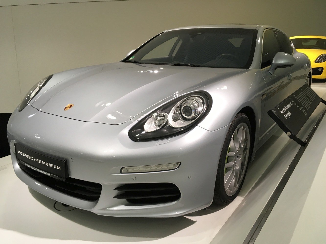 Silver sedan with rounded headlights and streamlined aerodynamic front.