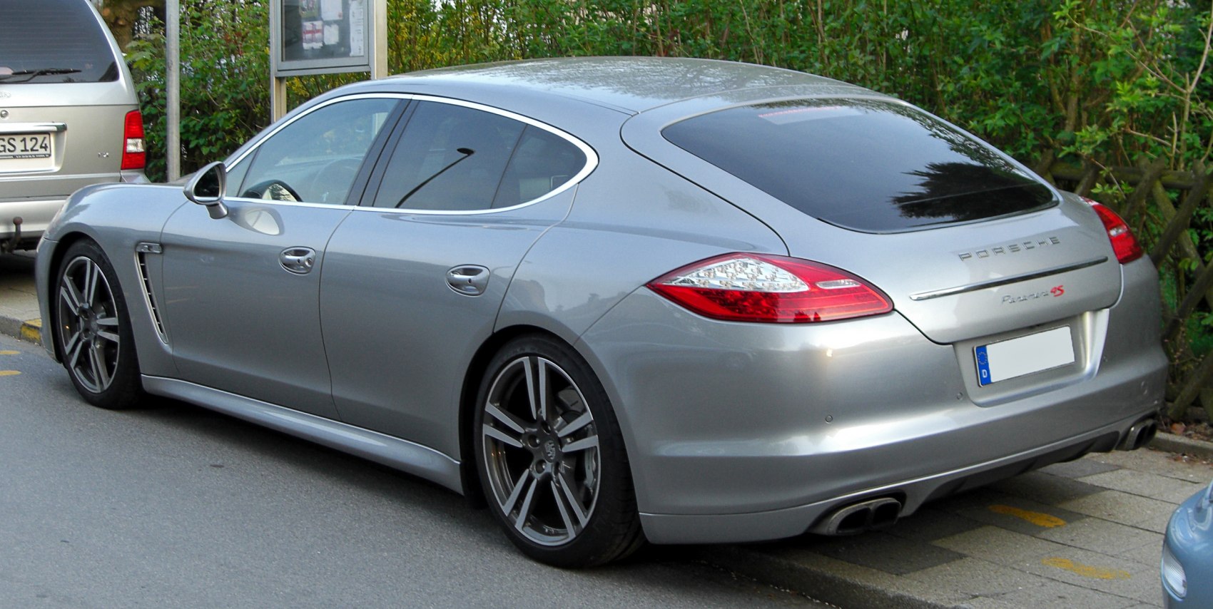 Silver Porsche Panamera G1 showing rear, side, alloy wheels, and exhaust pipes