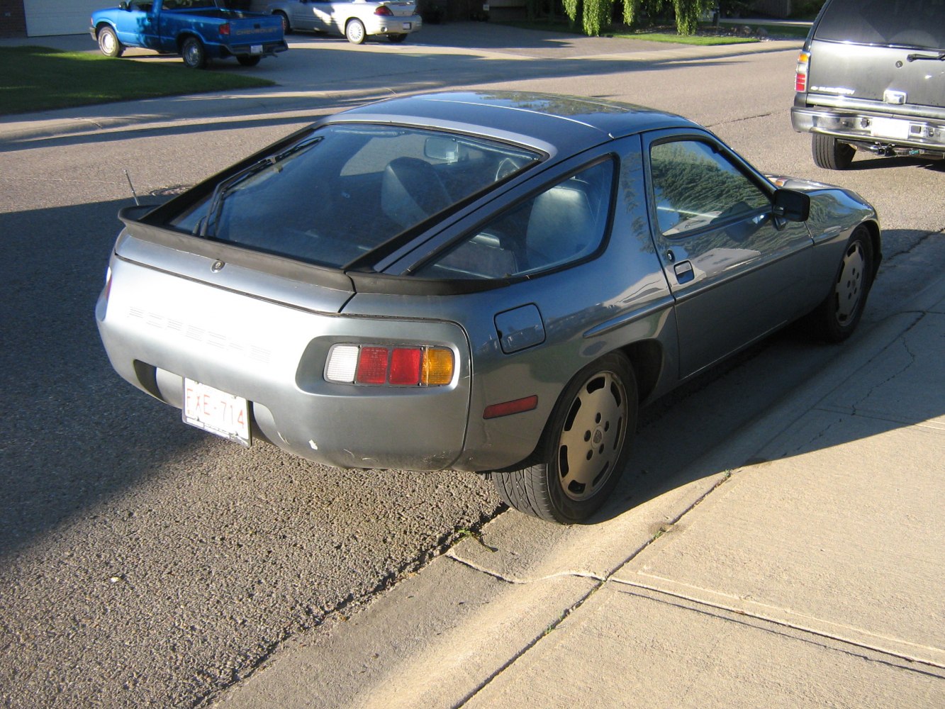 Rear three-quarter view with large hatch window and classic taillights