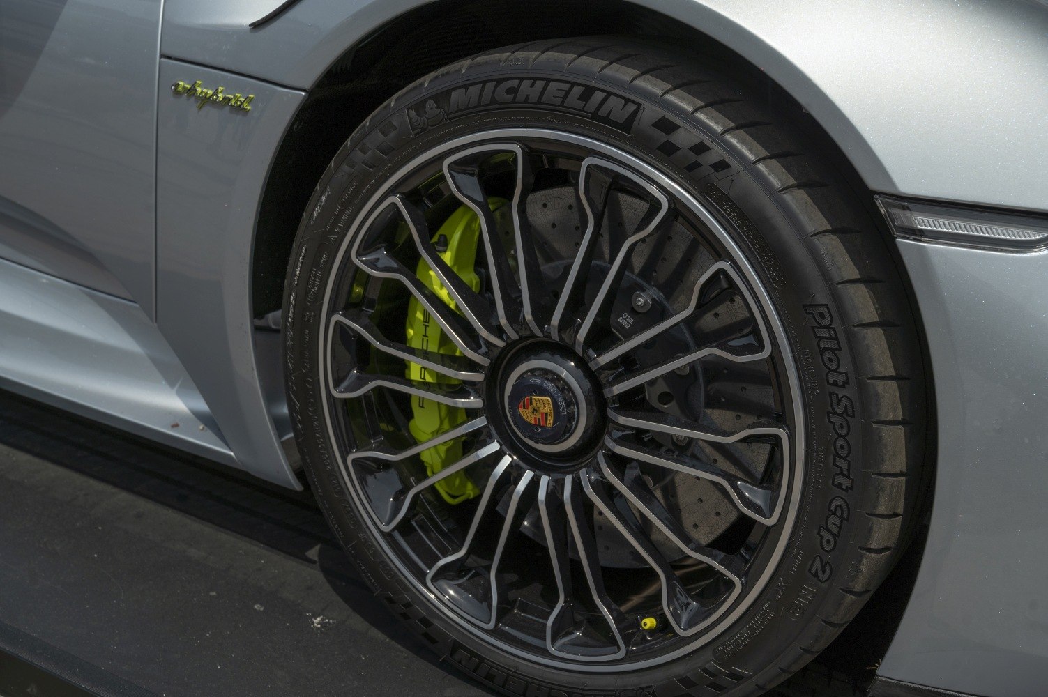 Alloy wheel with Michelin tire and yellow carbon ceramic brake caliper