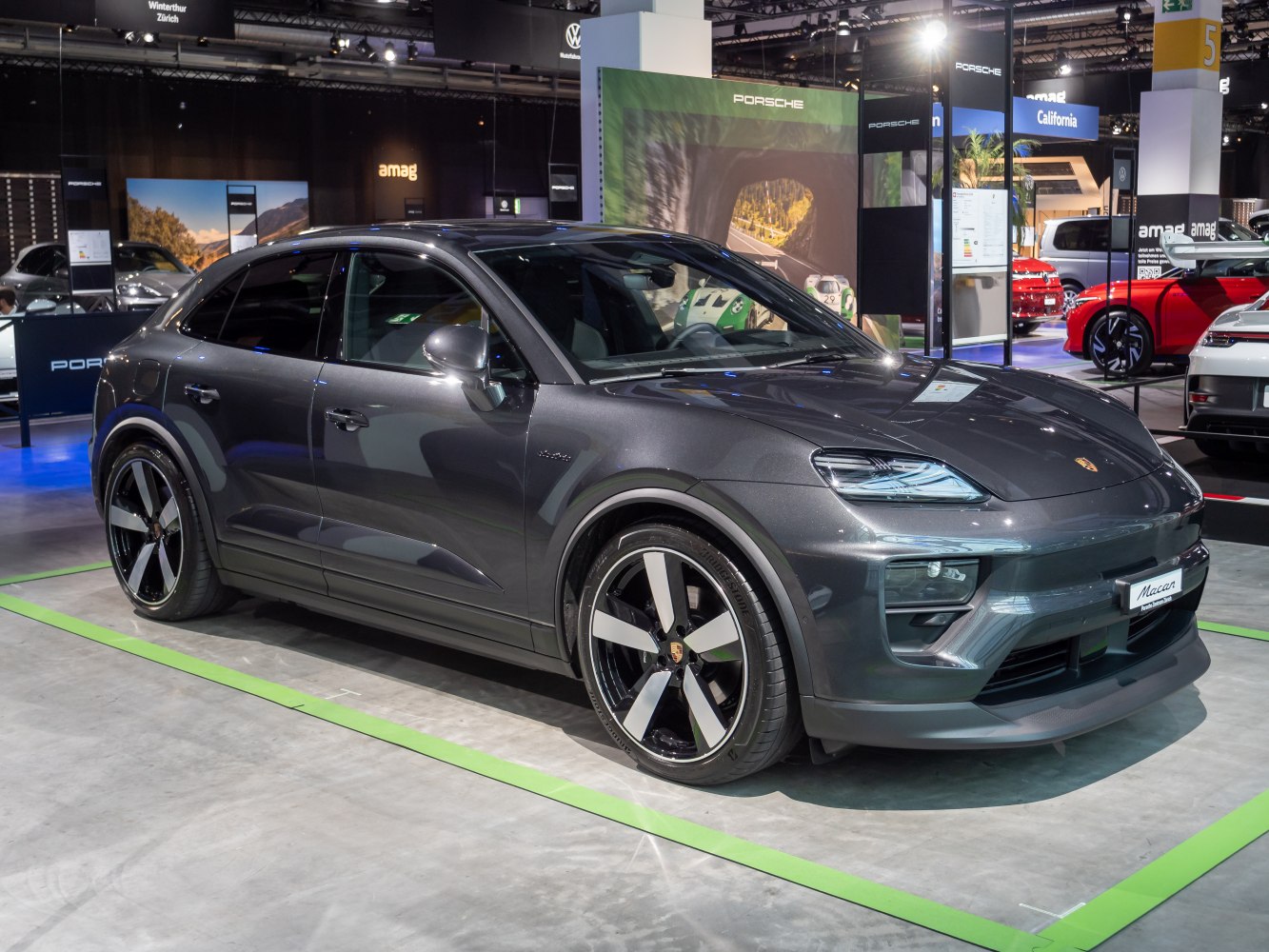 Side profile and front view of sleek 2024 electric SUV with modern headlights and alloy wheels
