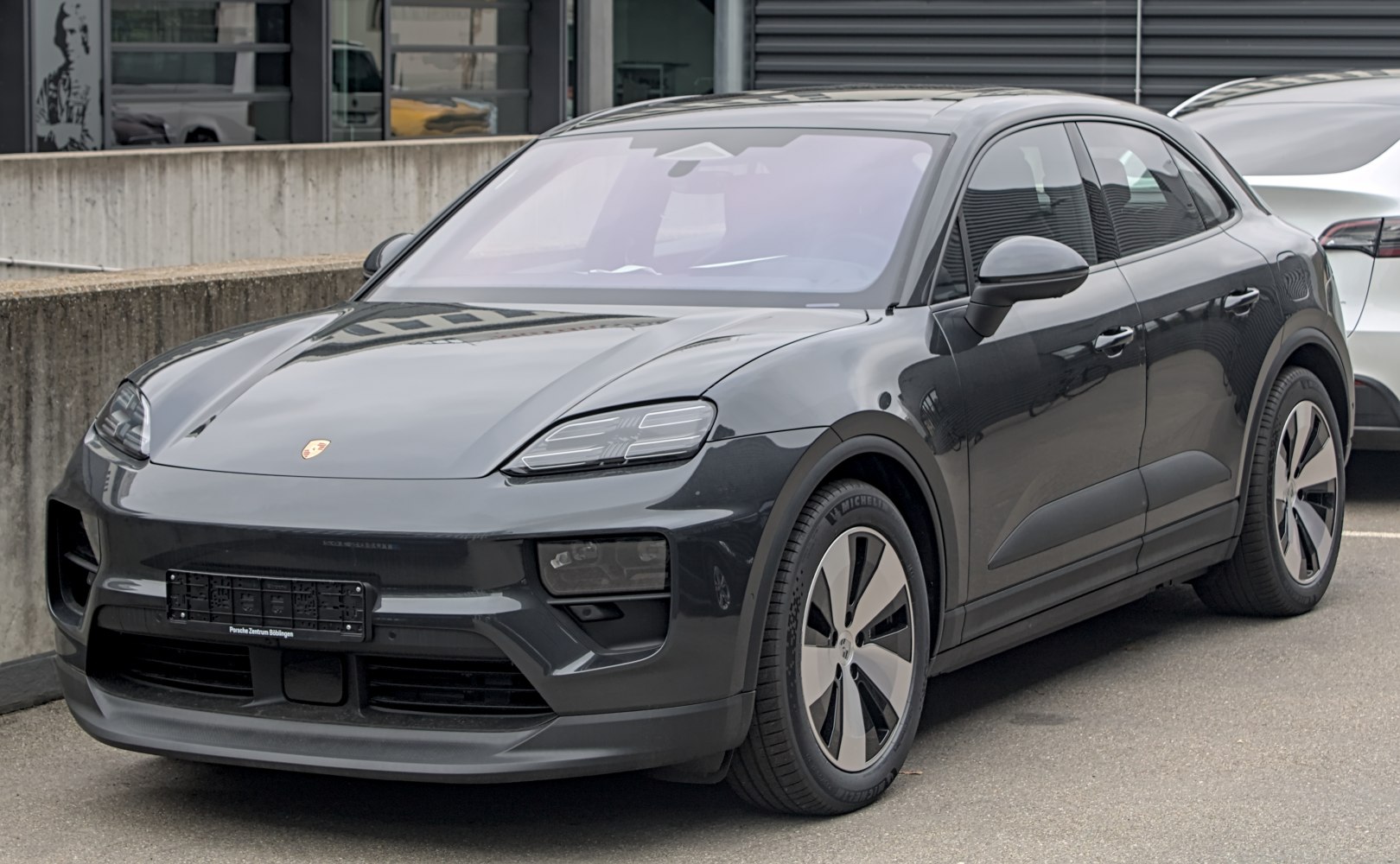 Electric SUV front side with LED headlights and aerodynamic wheels