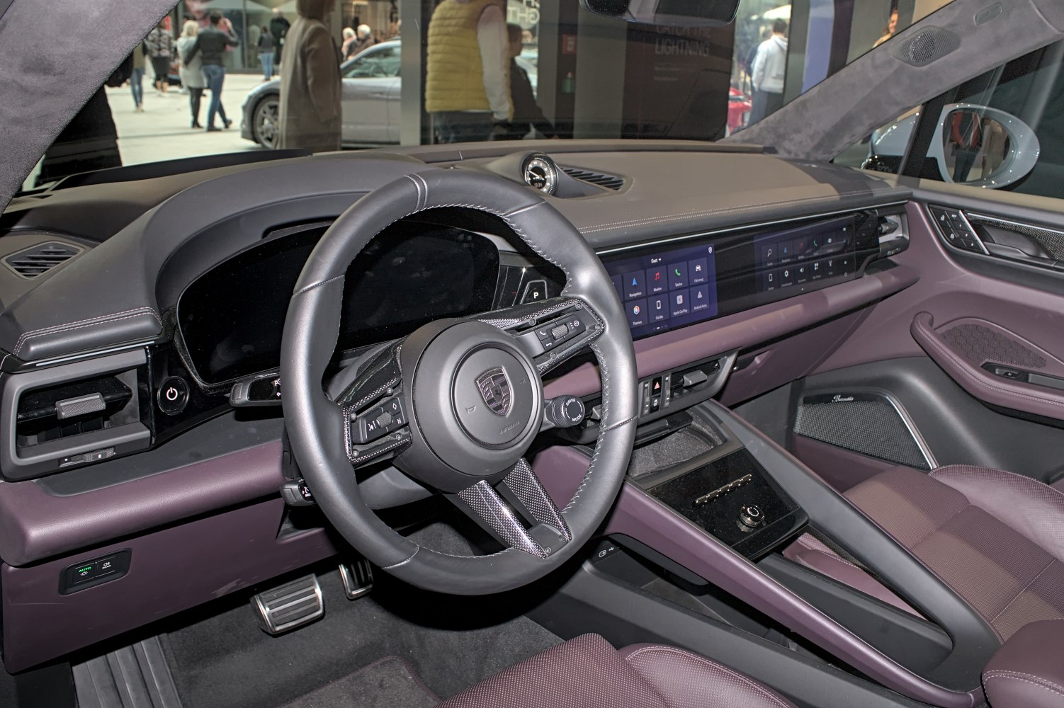 Futuristic electric SUV interior with digital dashboard and modern steering wheel